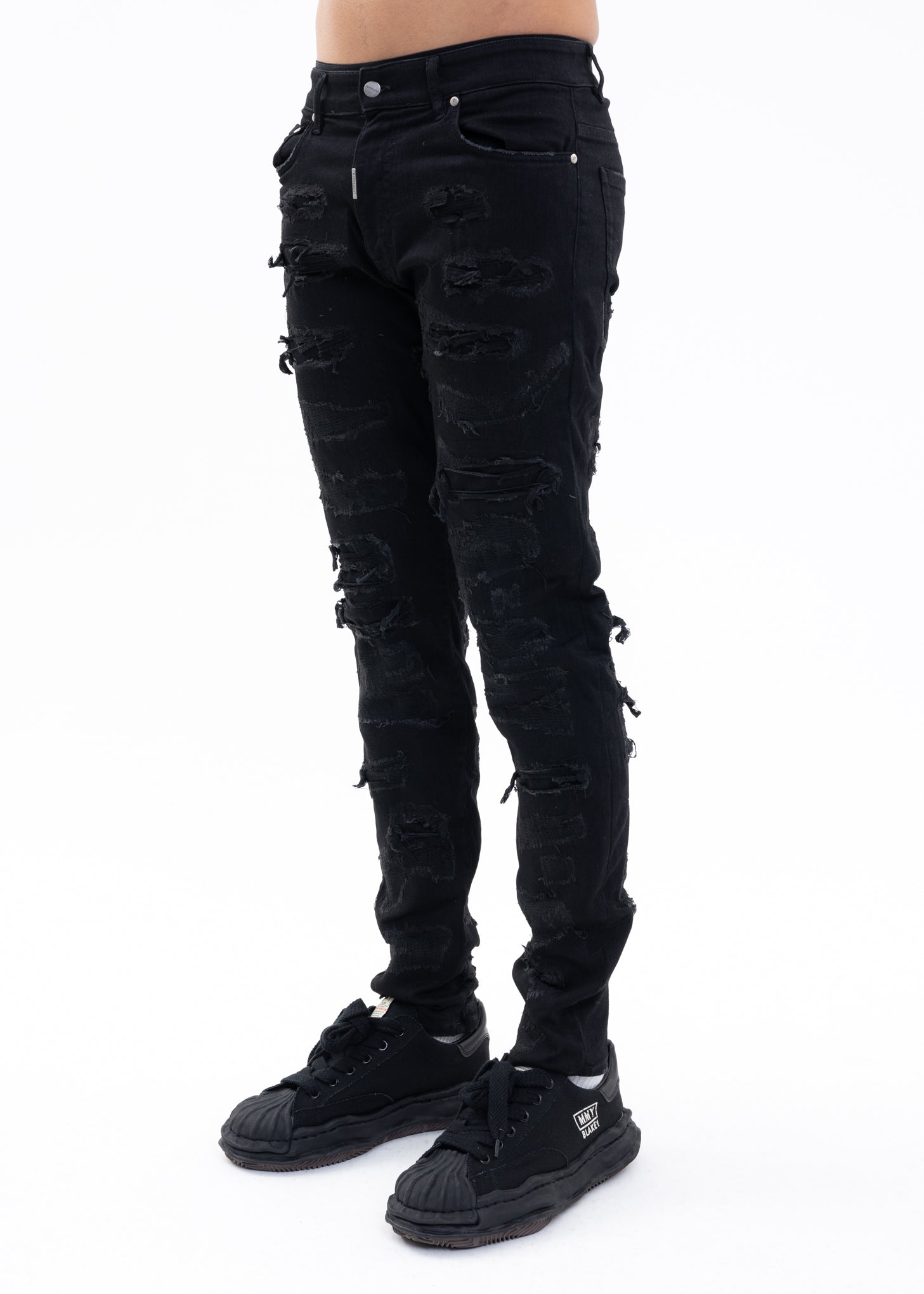 Black hot sale shredded jeans